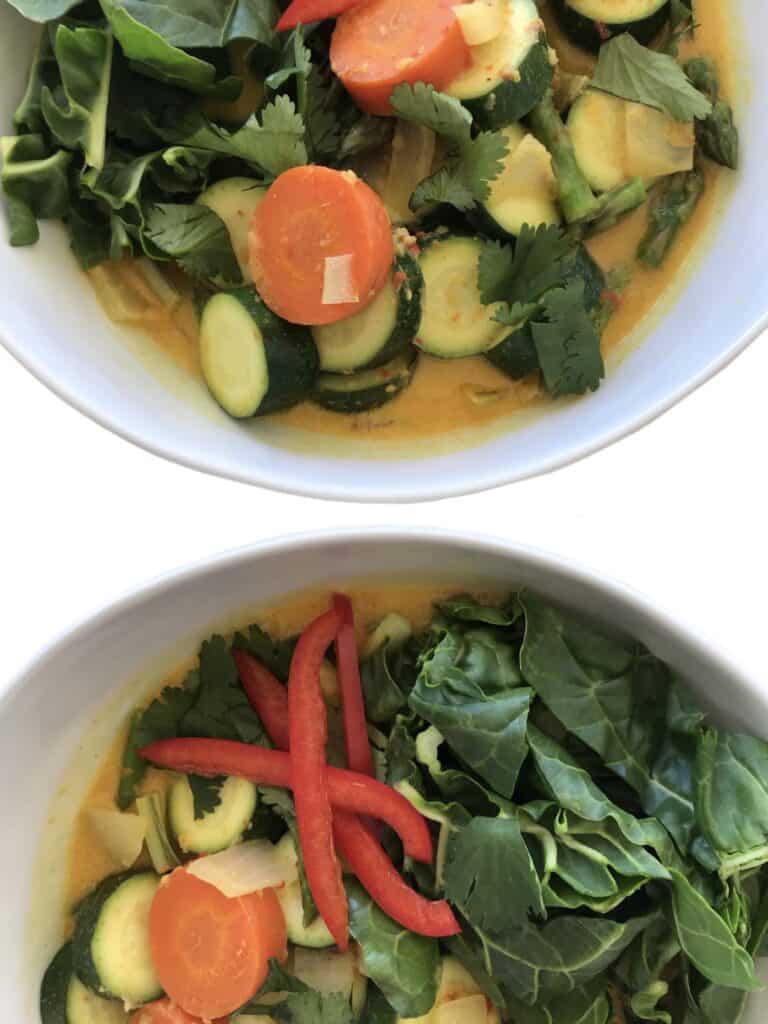 Healthy Vegan Thai Coconut Curry with vegetables. Garnish with cilantro, red bell pepper and enjoy with rice | StarseedKitchen.com