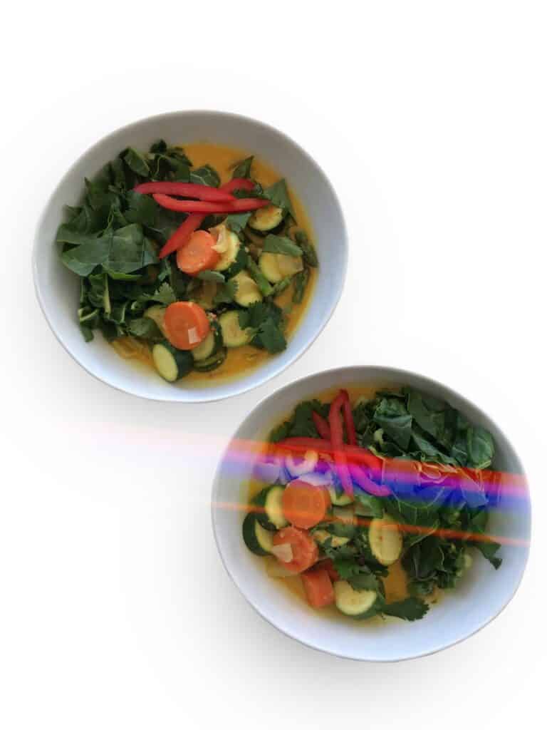 Yellow Coconut Curry with vegetables. Garnish with cilantro, red bell pepper and enjoy with rice | StarseedKitchen.com