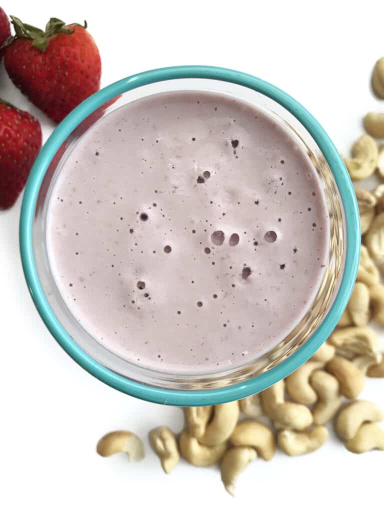 Thick and creamy sugar free cashew milk with strawberry