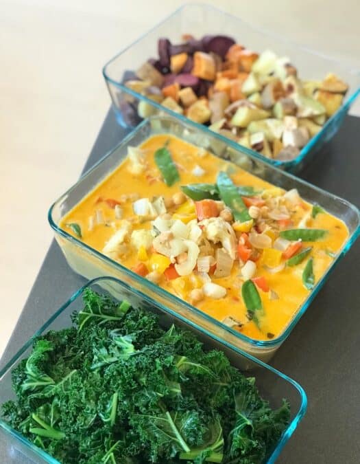 Image of plant based meal prep containers filled with colorful food