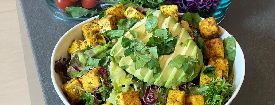 Golden Turmeric Adobo Tofu Cubes on salad